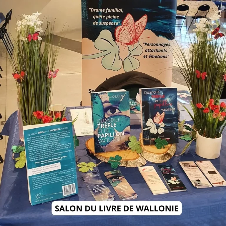 Roman Quand le Trèfle et le Papillon vacillent, ancienne et nouvelle couverture, présentés sur mon stand avec sa décoration florale, au Salon du Livre de Wallonie 2022